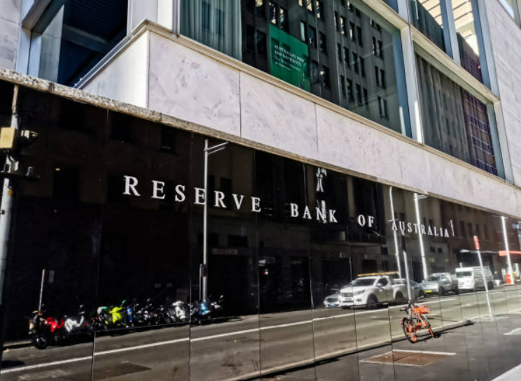 The imposing Reserve Bank of Australia building, symbolizing the center stage of financial decisions. Unraveling RBA's strategic pause and exploring exciting investment opportunities within the Australian economy.